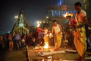 Priests performing the Ganga Aarti on the ghats of Varanasi on Dev Diwali evening